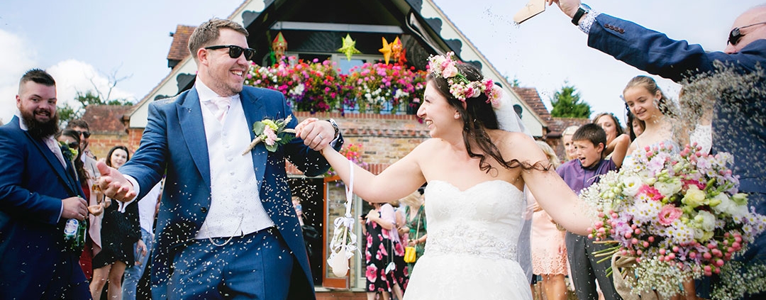 Colourful confetti photography at DIY summer wedding